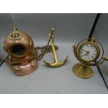 Brass divers helmet, compass clock and anchor with chain