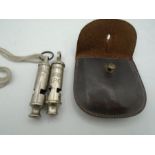 Two Whistles - The Acme Scout and The Metropolitan G.P.O in a leather belt pouch