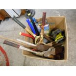 Box of vintage tennis rackets and cricket bats etc