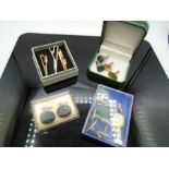 six sets of cufflinks and four tie clips in various boxes