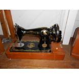 The Standard Manufacturing Co. Super De Luxe Sewing Machine with Lion decoration, hand operated