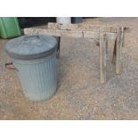Galvanised dustbin and 2 wooden trestles