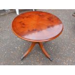 Cherry veneered occasional pedestal table with metal claw casters H49cm D57cm