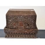 Victorian Chinese heavily carved box with stand and lid (loose), 49cm wide, 23cm deep, 41cm high.
