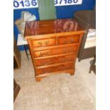 Small veneered two over three chest of drawers