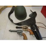 military style helmet, replica guns and a holster