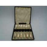 A boxed cake fork set