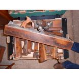 Tray of vintage wood planes and profile moulding planes