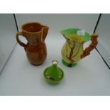 A Burleigh ware Squirrel handled jug 20cm tall, a brown glazed stone ware jug 20cm and a Moroccan