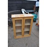 Pine two door glazed display cupboard, 80cm W, 106cm Tall, 29cm deep