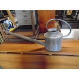 galvanised watering can