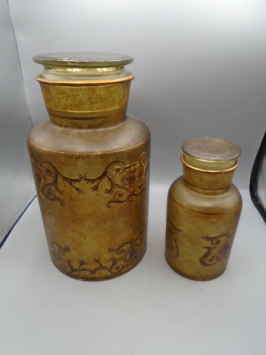 2 decorative glass jars with lids