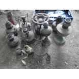 quantity of oil lamps and accessories