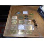 17 brass Norfolk rally plaques and 1 corkscrew