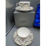 Royal Worcester cabinet cups and saucers x 2