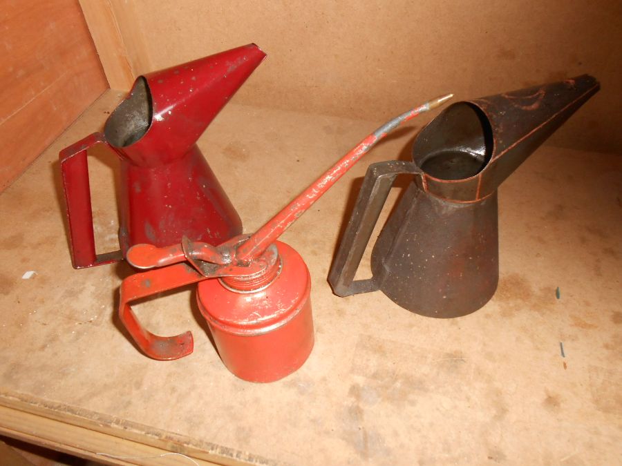 3 small vintage oil cans