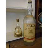 giant bells bottle and Bols gold liquor musical ballerina bottle