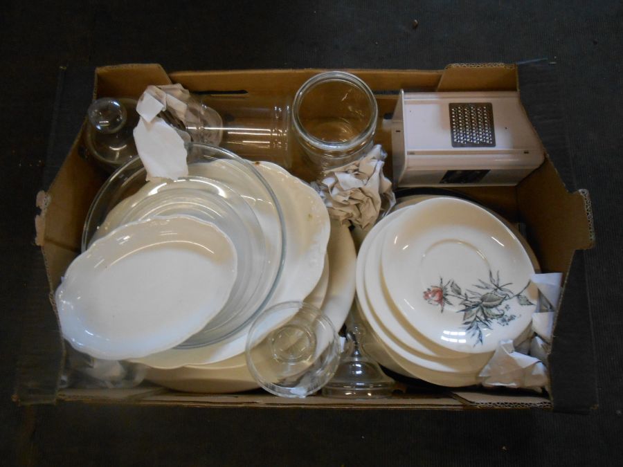 Stillage containing mostly kitchenalia including pots and pans, china, glass and plastic storage