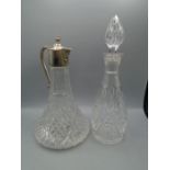 Claret jug with silver plated handle and rim and a cut glass decanter