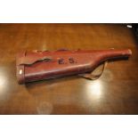 A good quality leather leg of mutton gun case, with space for 30" barrels embossed E.S. with Boss &