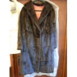 Canadian squirrel fur coat, 3/4 length with hook and eye fastening and inner waist tie