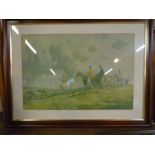 A framed print of a fox hunting scene