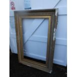 Decorative gilded over plaster mirror/picture frame H166cm W114cm approx a/f