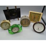 Collection of retro clocks and a thermometer