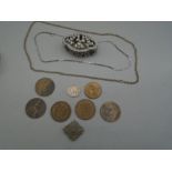 A small amount of coinage, a trinket pot with 2 chains, one stamped 925