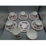 Paragon 'Michelle' part tea set comprising 6 cake plates, 6 saucers, 5 cups, milk jug and sugar