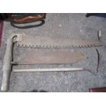 Vintage peat cutter, saw and scythe