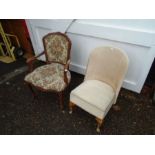 Carved hardwood armchair with embroidered seat and back and upholstered nursing chair both for re-