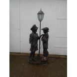 Bronzed effect resin garden lamp depicting boy and girl H172cm approx