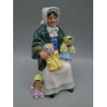 Royal Doulton 'The rag doll seller' figurine, signed on bottom