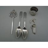Silver greyhound pendant, napkin ring, sterling silver cigar clipper, letter opener, 2 grapefruit