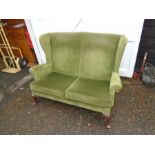 Vintage green Parker Knoll upholstered wing back 2 seater sofa to be re-upholstered
