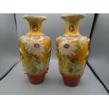 A pair of Japanese vases 12" tall