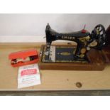 VINTAGE SINGER SEWING MACHINE IN CASE WITH KEY AND A BUTTON HOLE ATTACHMENT IN ORIGINAL BOX