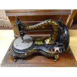 Vintage Jones hand sew machine in case