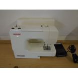 Janome sewing machine model j3-24 with manual and accessories