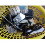 Basket containing motorbike parts etc