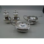 2 silver mustard pots with glass liners and spoons and a pair of cruet pots, all hallmarked. 287g