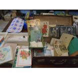 A case of ephemera containing birthday cards, diaries, news clippings, photo's etc