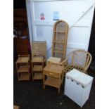 Quantity of wicker furniture including shelving unit linen bins and chairs etc