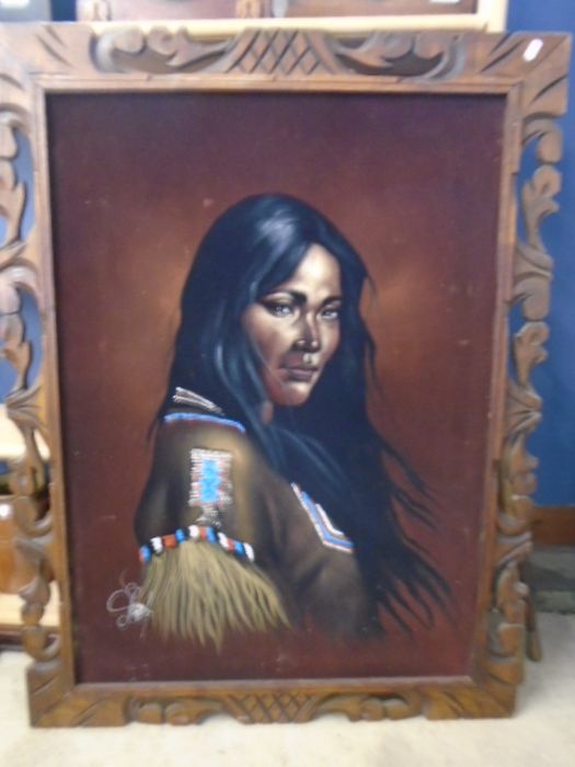 Signed embellished print of a native woman in a carved wooden frame 80x100cm