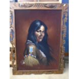 Signed embellished print of a native woman in a carved wooden frame 80x100cm