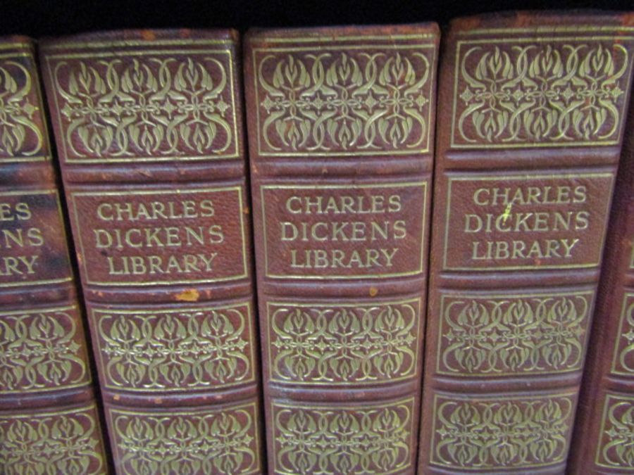 Vintage oak bookcase containing 17 books from the Charles Dickens Library and one other book. - Image 3 of 3