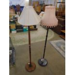 2 wooden floor lamps