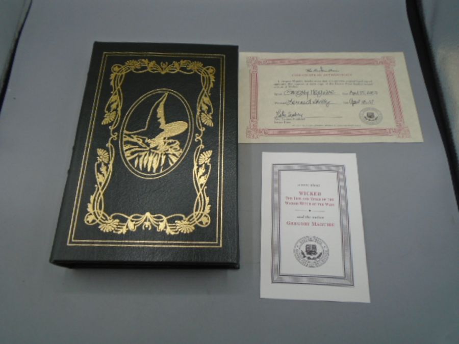 Signed collectors edition of Wicked by Gregory Maguire,2007 with green leather bound. certificate of