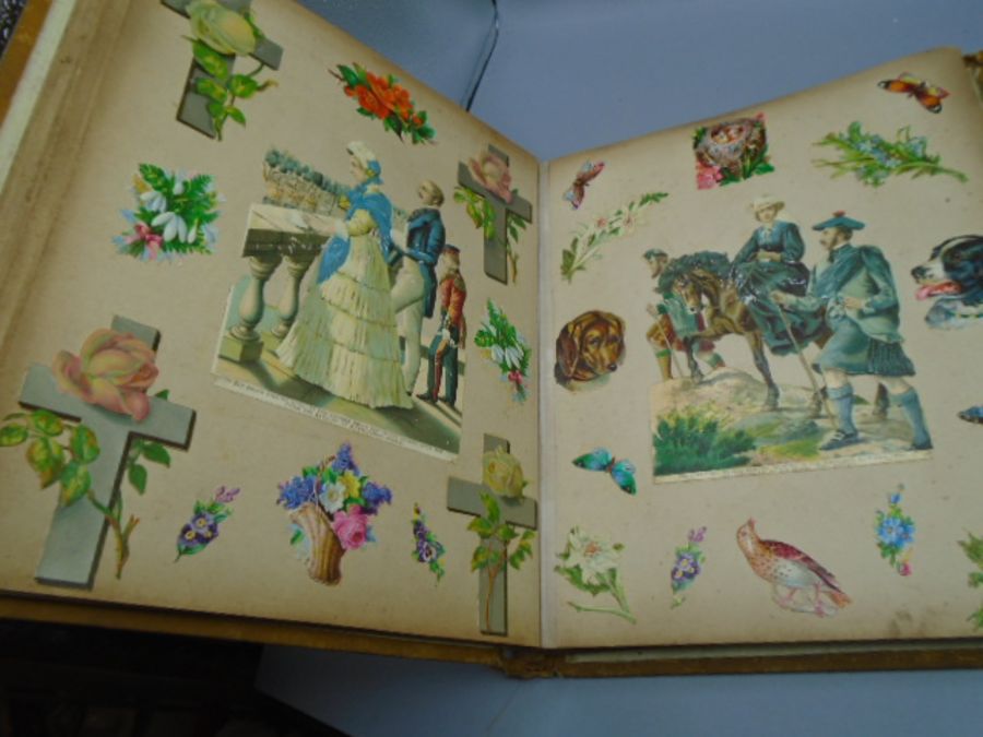 A Victorian scrap book full of cut out pictures - Image 6 of 7